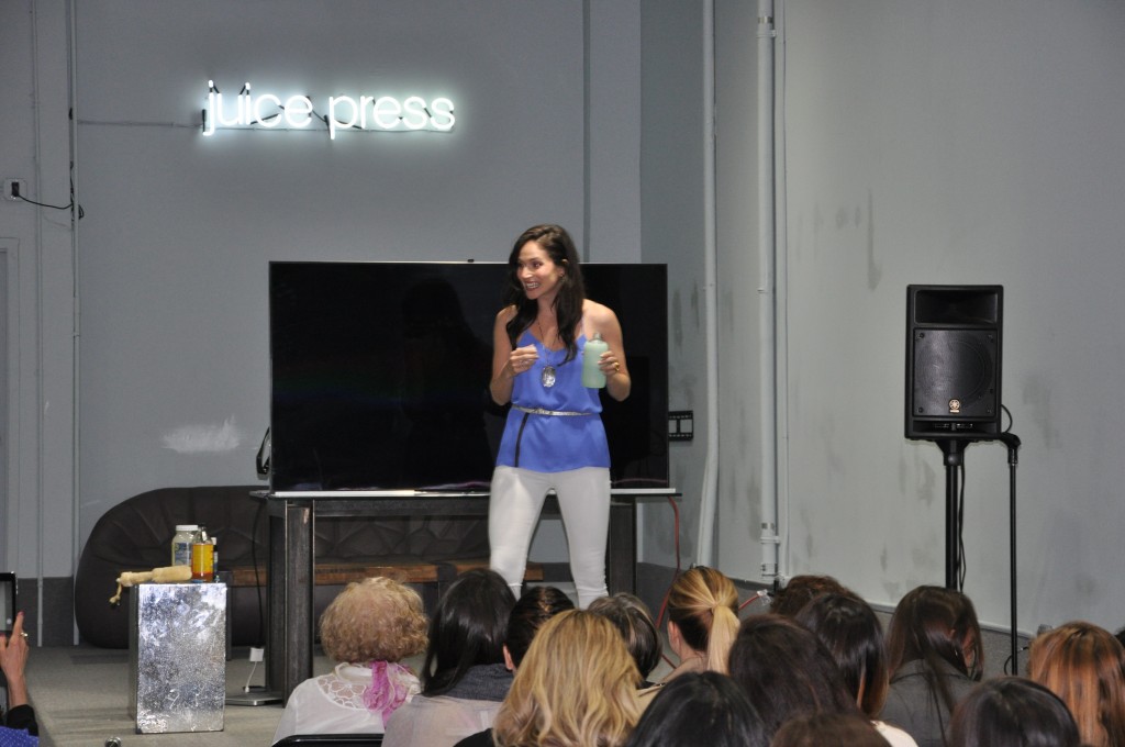 arielle haspel speaking at juice press event