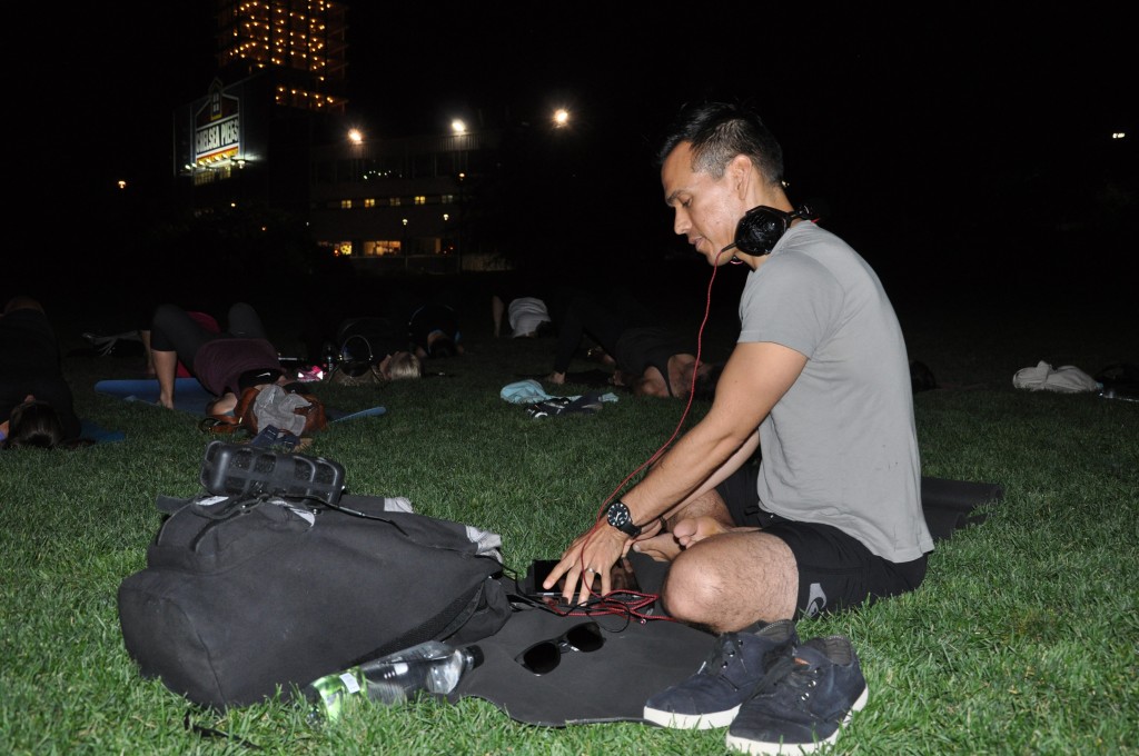 Kris Karuna DJing at sunset yoga event