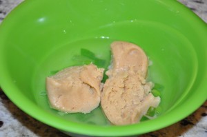 Mixing the miso into the hot broth...