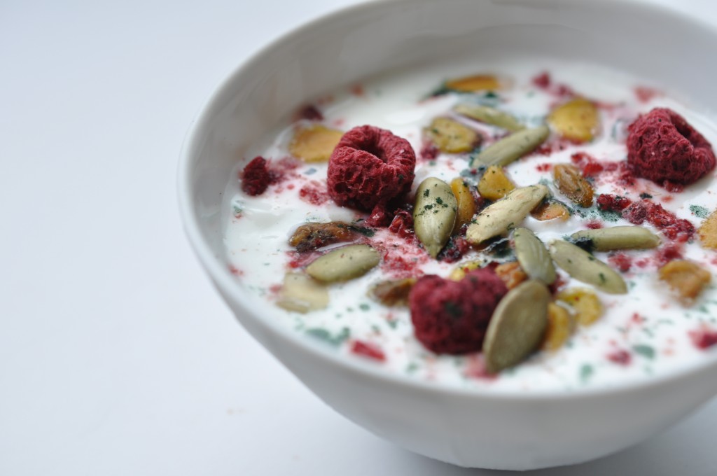 yogurt by bewellwitharielle with berries and nuts