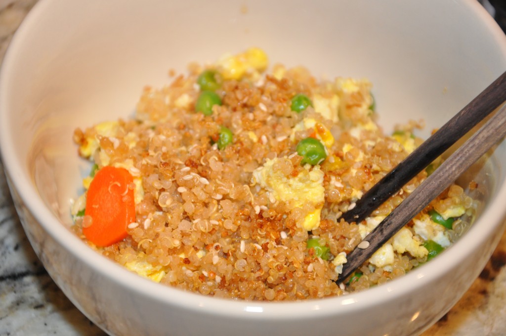 unfried rice with chopsticks