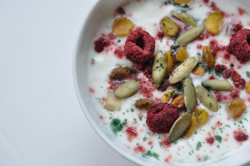 yogurt by bewellwitharielle with berries and nuts