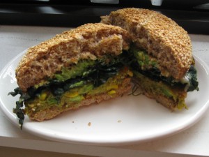 Dr. Praegers veggie burger on an Ezekial bun with kale and avocado!