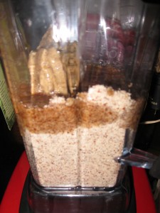 Place all ingredients into the blender (except for slivered almonds/raw whole almonds)