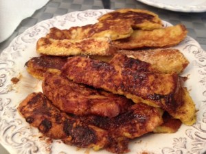 Coconut-Crusted French Toast - made with: Farmer's Market Bread + Farm-Fresh Eggs + Fresh Organic Milk + Shredded Coconut + Coconut Oil.