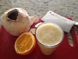 Coconut-Orange Creamsicle-  made with fresh young coconut water + coconut meat + 1/2 organic Florida orange + ice. Delish!